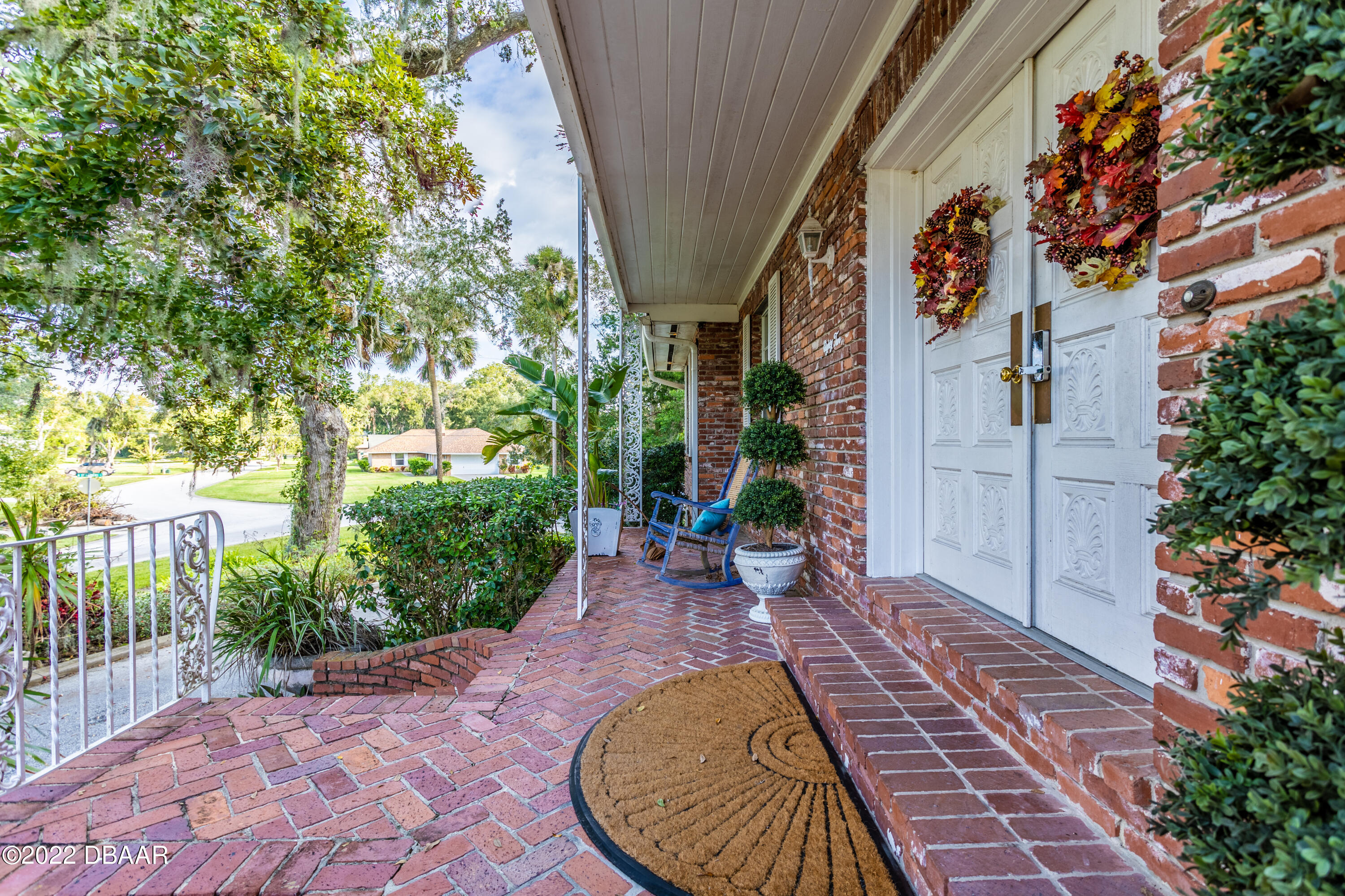 82 North St Andrews Drive Ormond Beach, FL 32174 - Photo 6 of 60 a view of a house with a small backyard