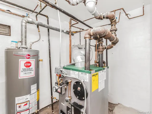 a view of storage and utility room with a fan