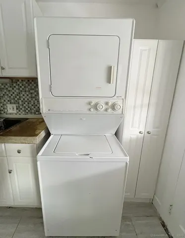 a front view of a house with garage