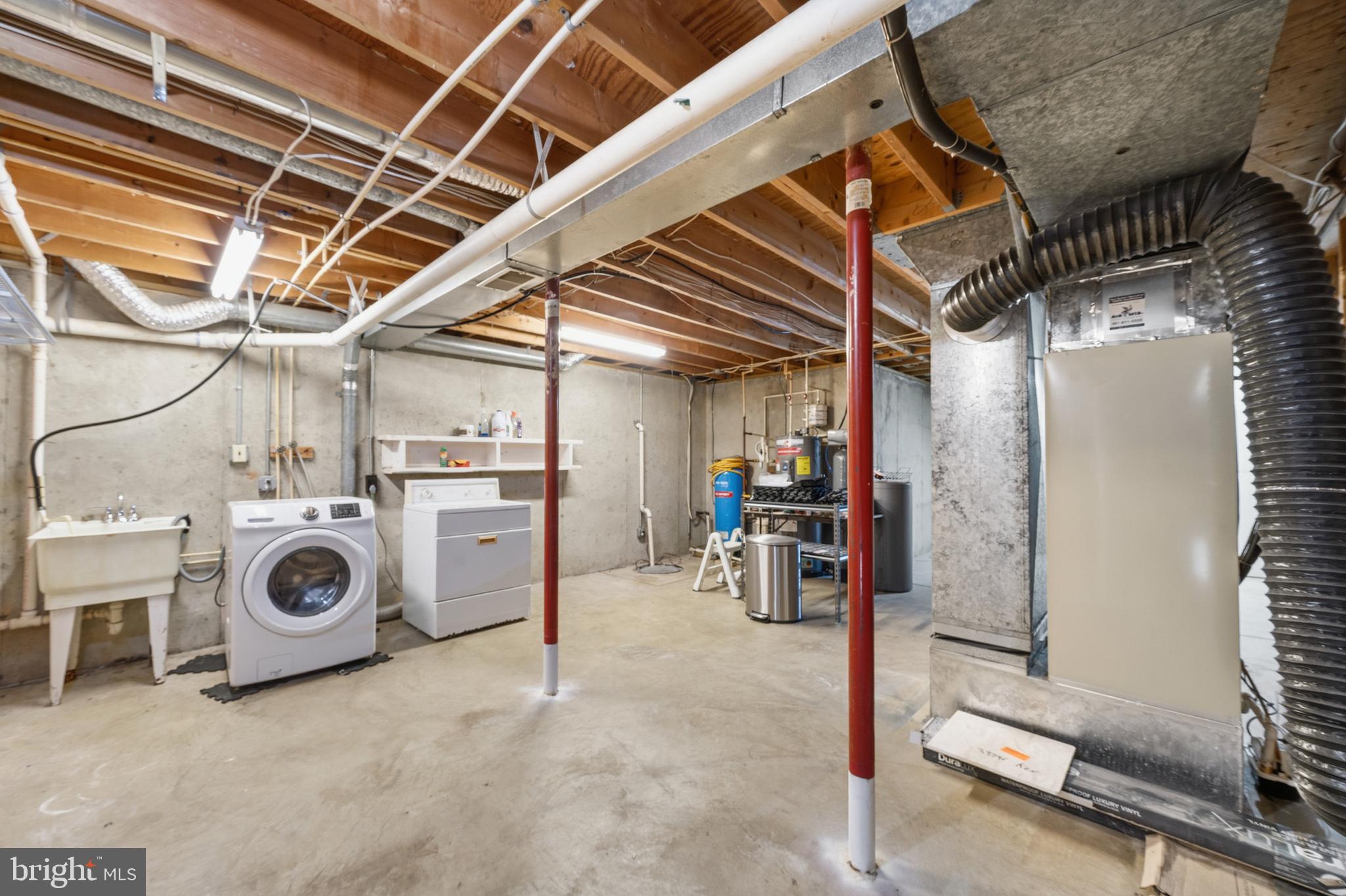 21031 Clarksburg Road Boyds, MD 20841 - Photo 48 of 79 Large utility area in the basement, water softener