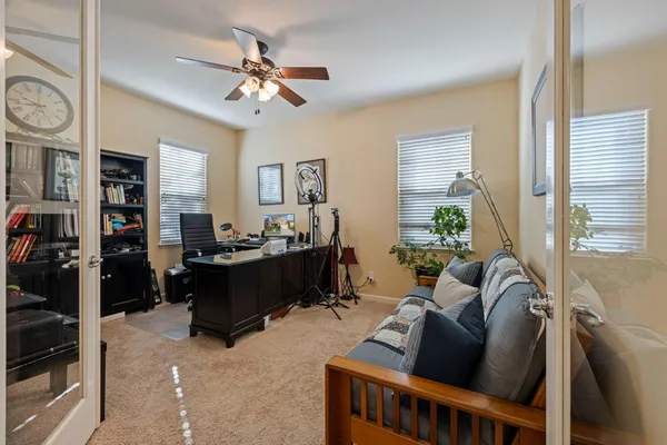 a bed room with furniture and a window