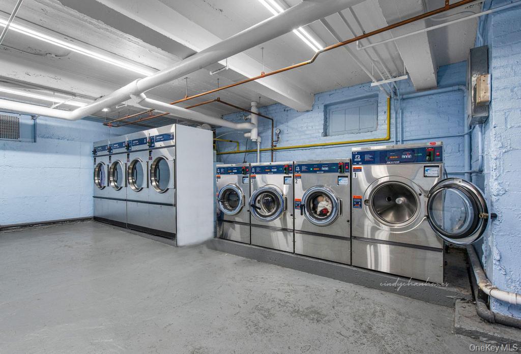 100-10 67th Road, Unit 6L Queens, NY 11375 - Photo 25 of 26 a utility room with dryer and washer