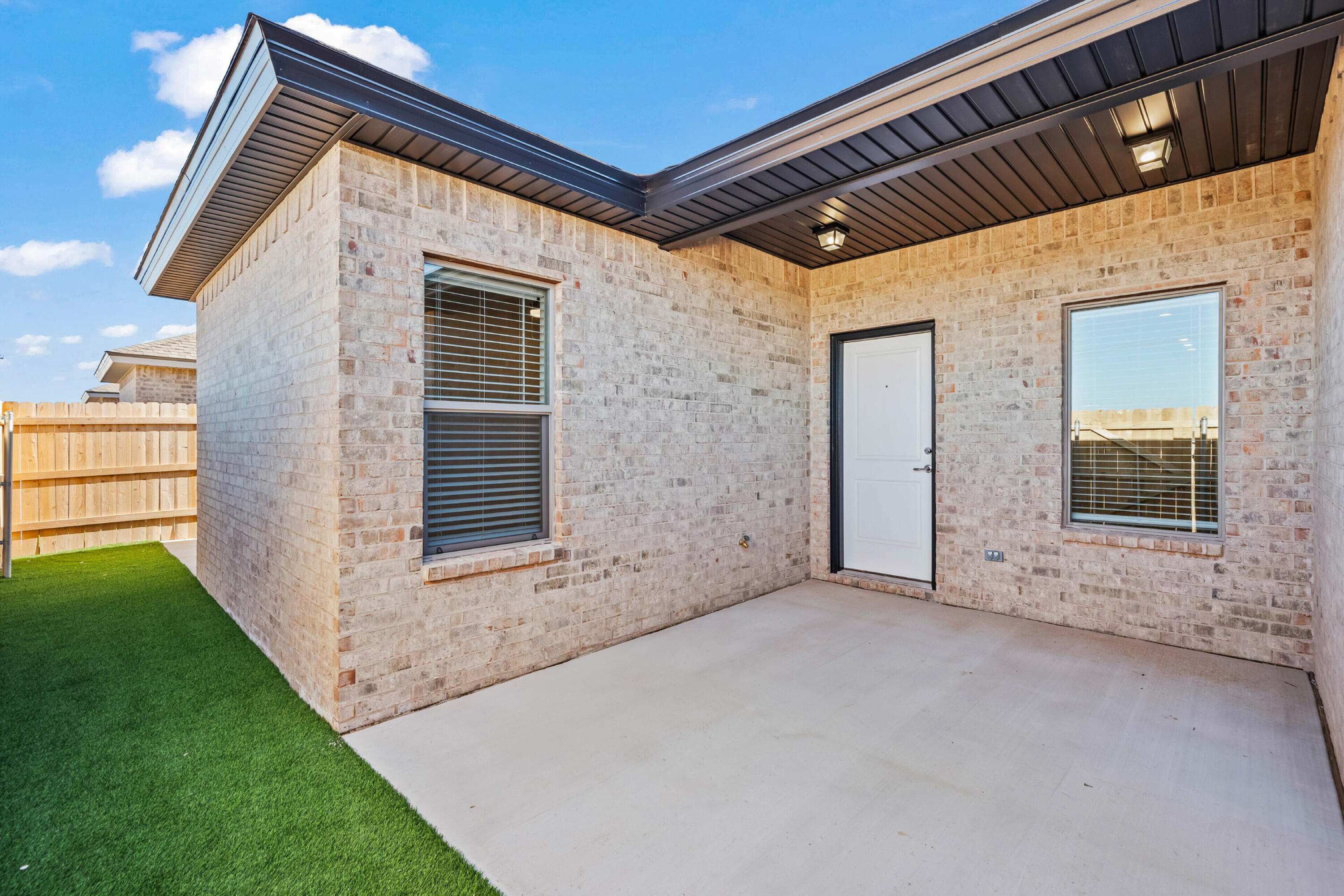 7014 40th Street, Unit A Lubbock, TX 79407 - Photo 18 of 19 a view of an house with backyard