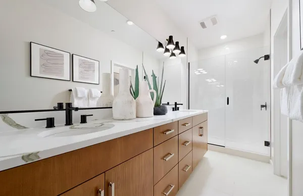 a kitchen with stainless steel appliances kitchen island granite countertop a refrigerator and a stove top oven