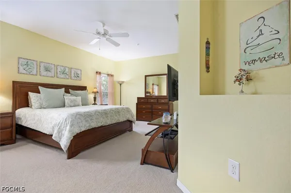 a view of a lake with a building in the background