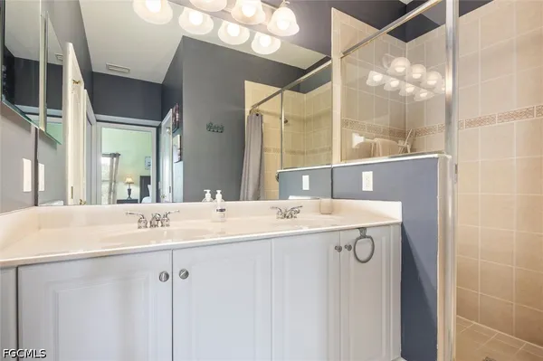 a view of storage and utility room with racks on the wall