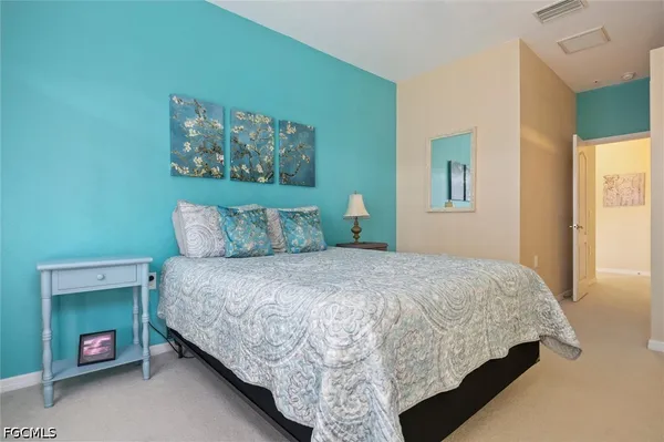 an aerial view of a house with yard