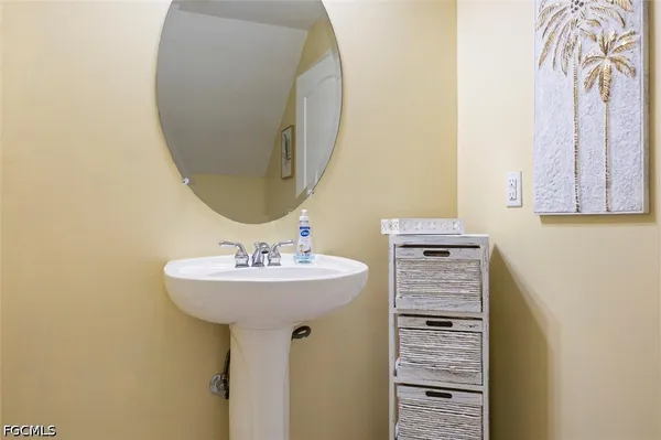 an aerial view of a house with a lake view