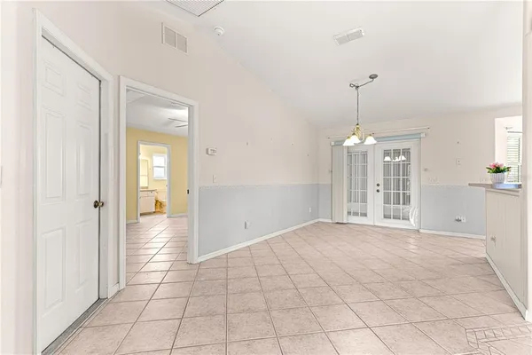 a view of an empty room and window