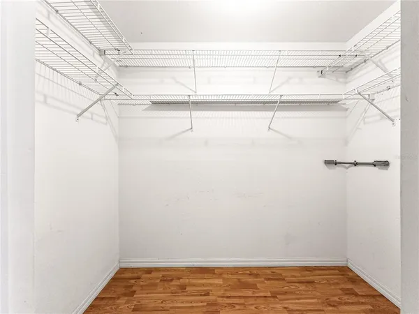 a view of a room with racks on the wall