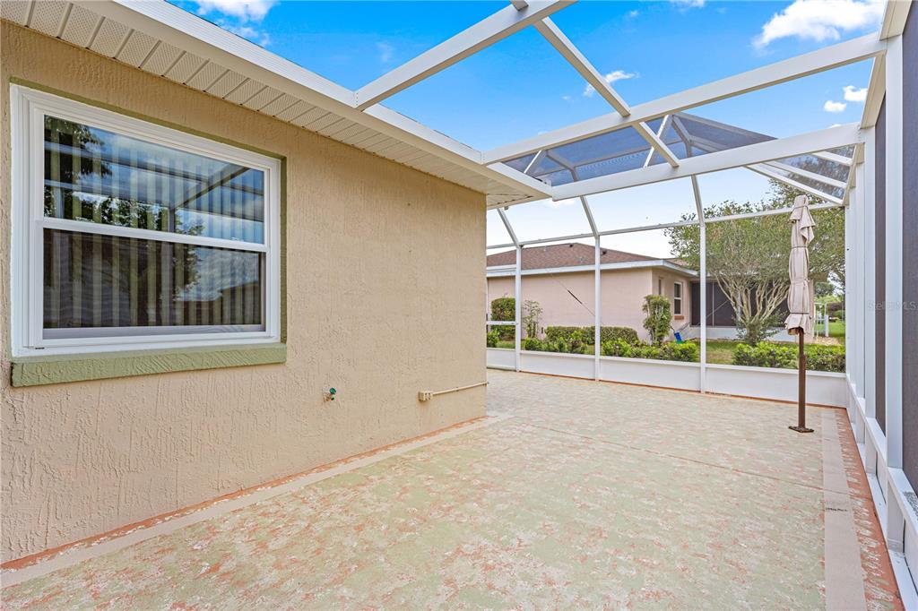 9958 Southwest 59th Circle Ocala, FL 34476 - Photo 23 of 45 a view of an empty room with a window