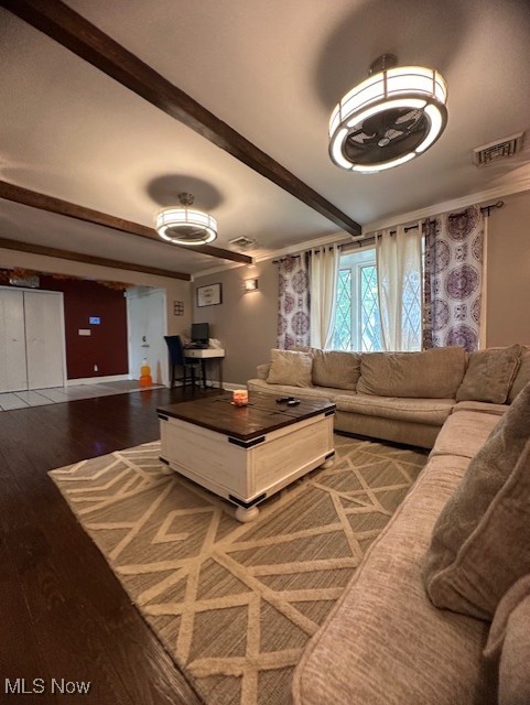 41810 Parsons Road Lagrange, OH 44050 - Photo 3 of 19 Living room with wood-type flooring and beamed ceiling