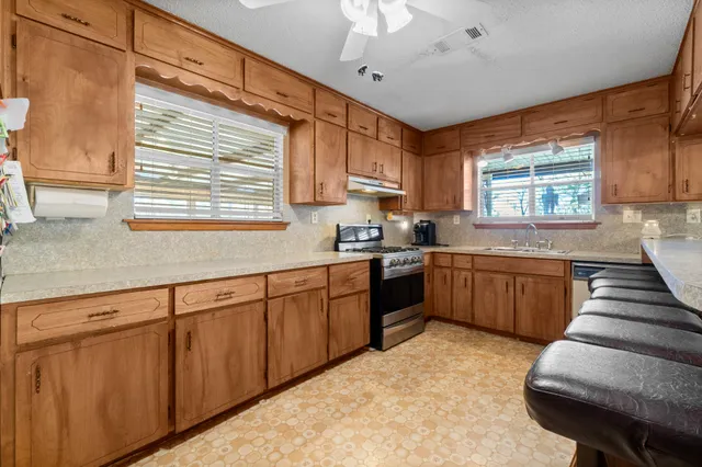 a view of dinning table and chairs