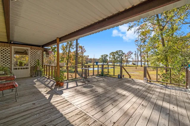a view of yard with swimming pool