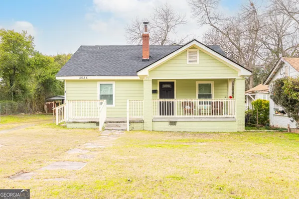 a view of a house with a swimming pool