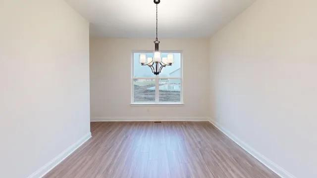 a room with window and wooden floor