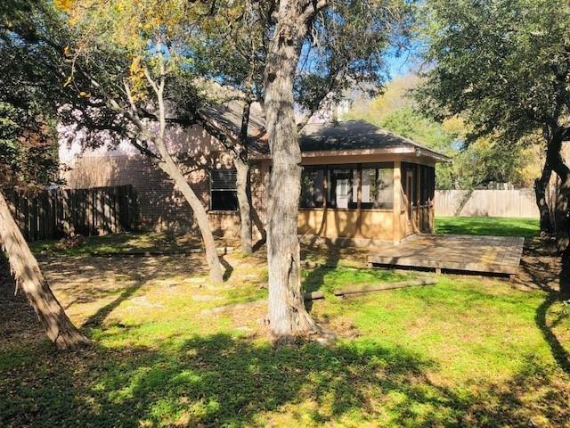 1608 Tristan Way Cedar Park, TX 78613 - Photo 14 of 18 Rear view of property with a deck and a sunroom