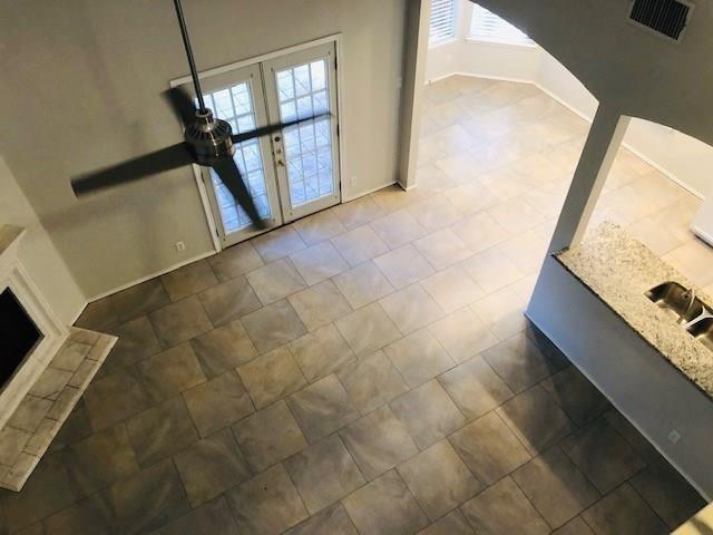 1608 Tristan Way Cedar Park, TX 78613 - Photo 5 of 18 Exercise area with baseboards and french doors