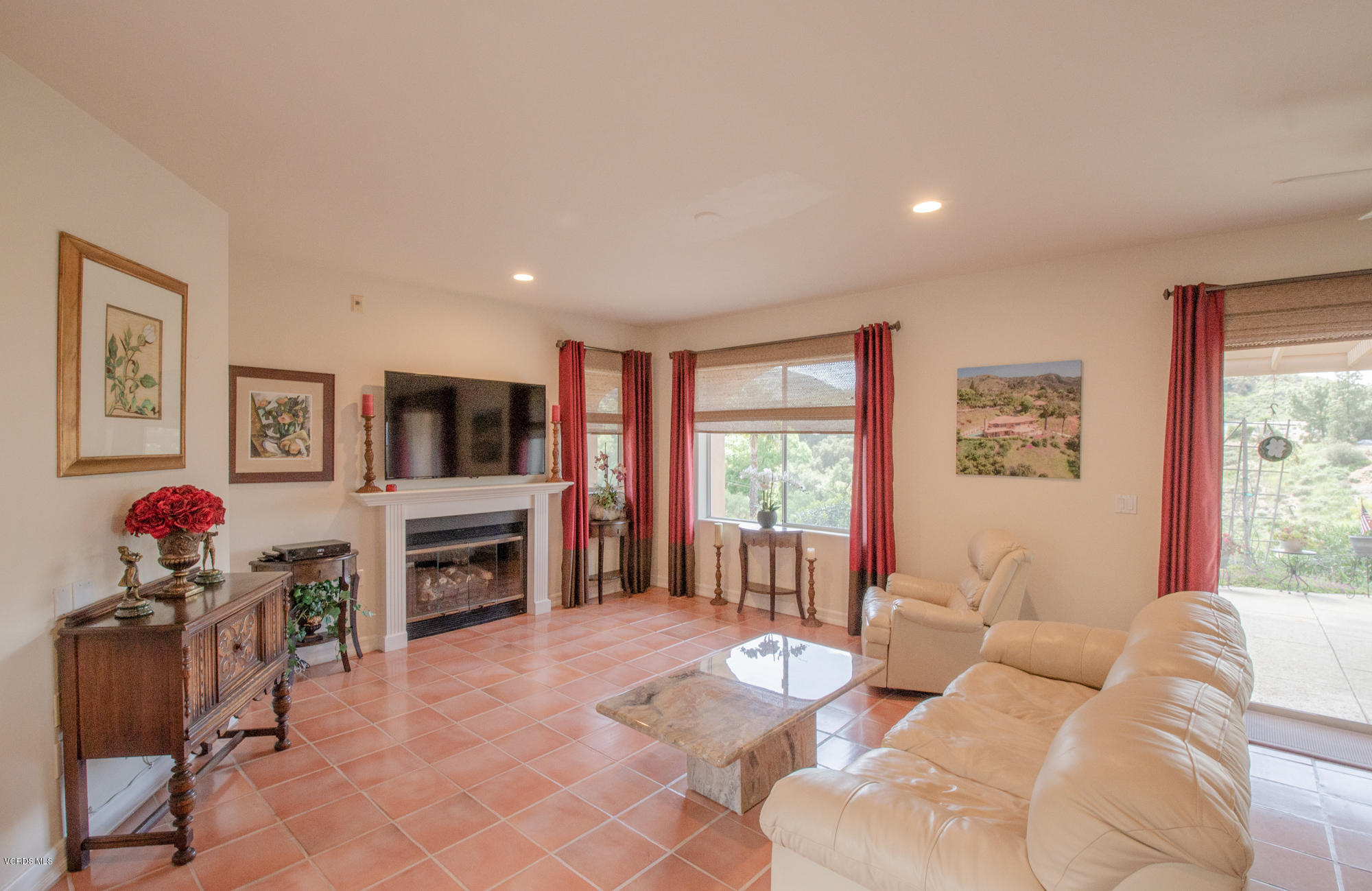 180 Sundown Road Thousand Oaks, CA 91361 - Photo 12 of 32 a living room with furniture fireplace and flat screen tv