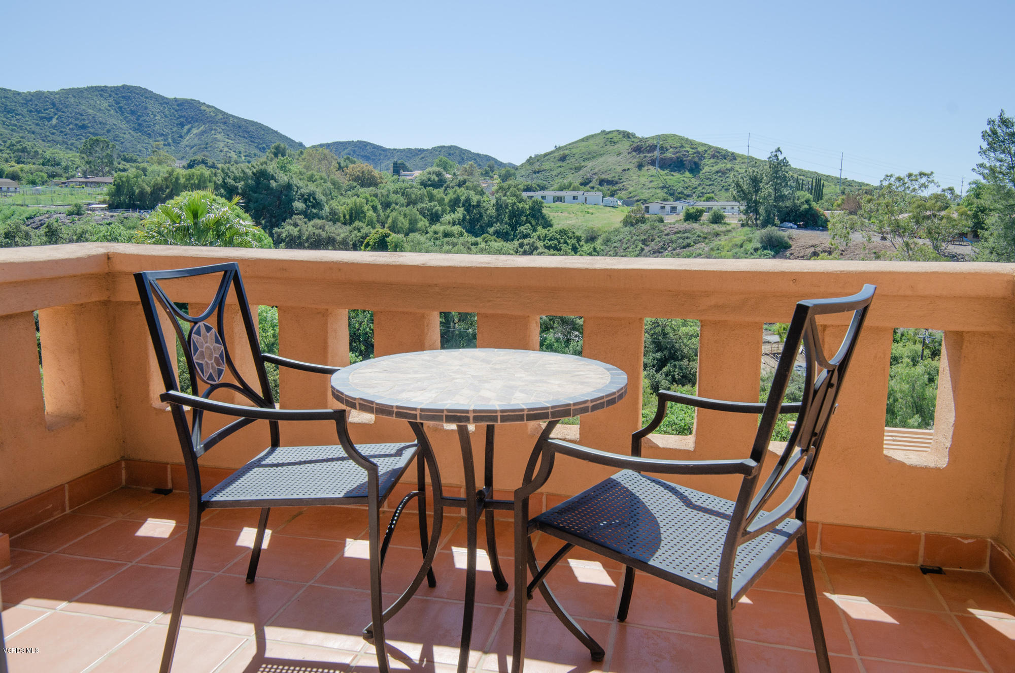 180 Sundown Road Thousand Oaks, CA 91361 - Photo 17 of 32 a view of a chairs and table in the terrace