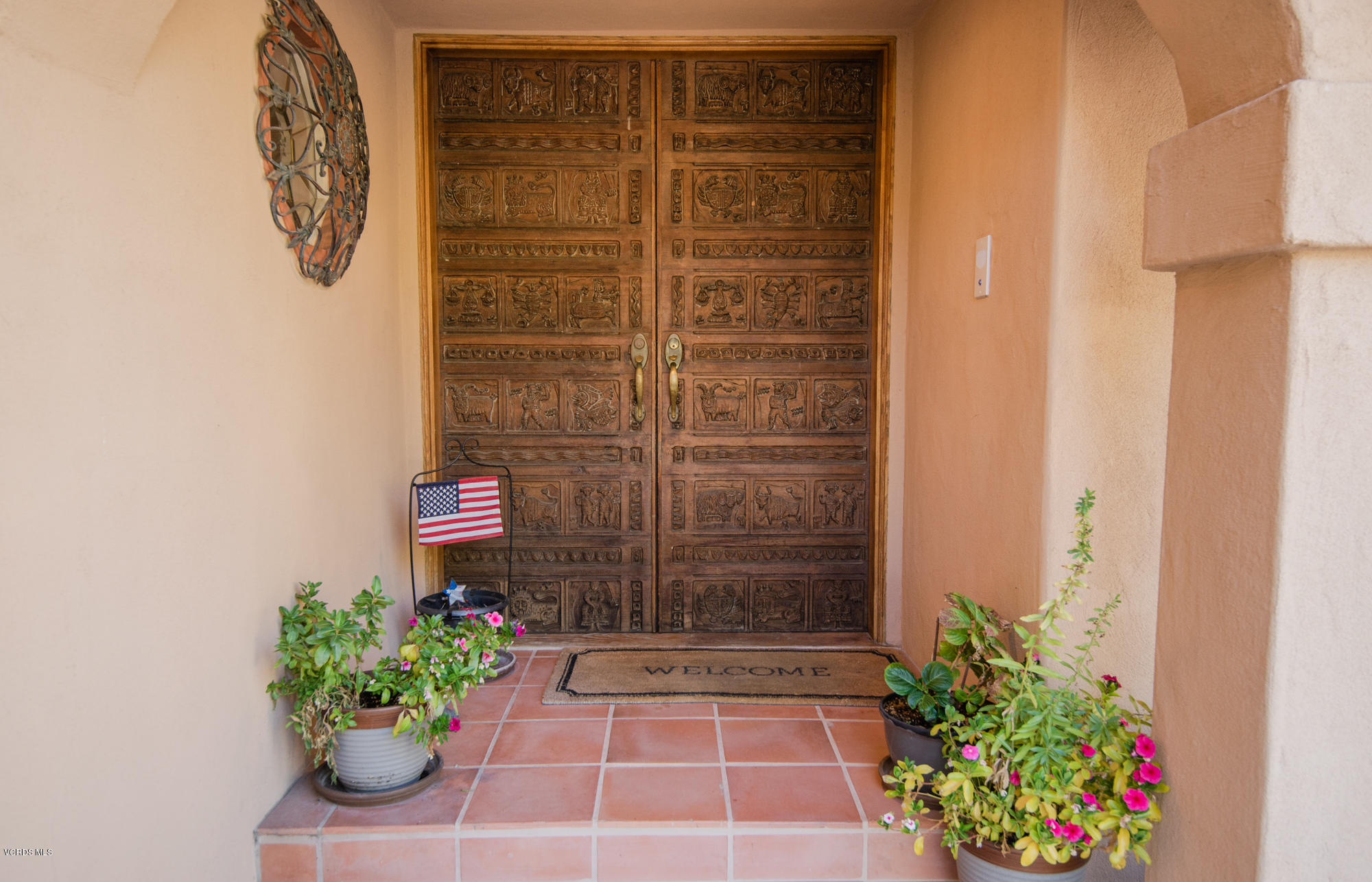 180 Sundown Road Thousand Oaks, CA 91361 - Photo 20 of 32 a view of a door with a potted plant