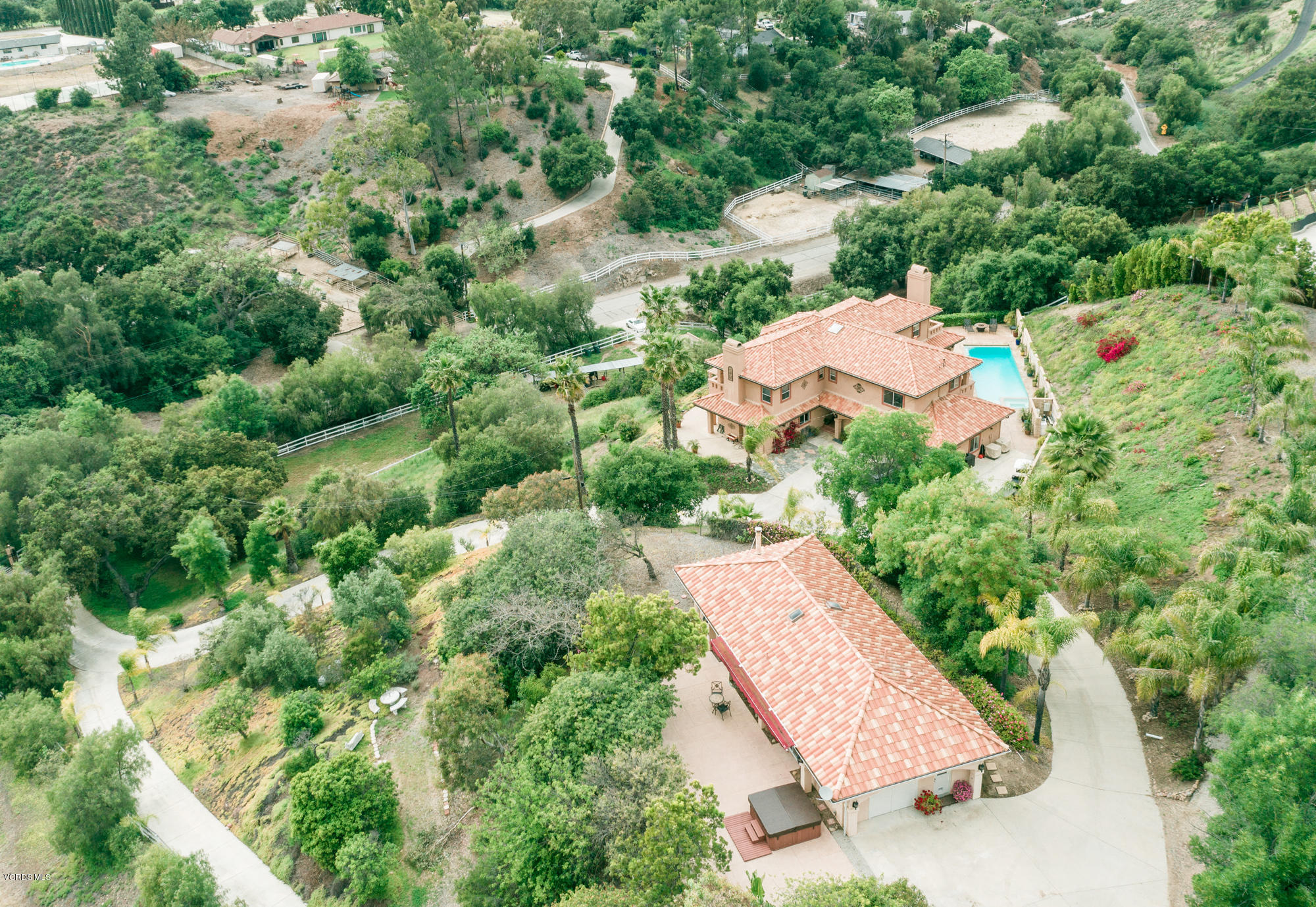 180 Sundown Road Thousand Oaks, CA 91361 - Photo 22 of 32 an aerial view of a house with a yard and lake view