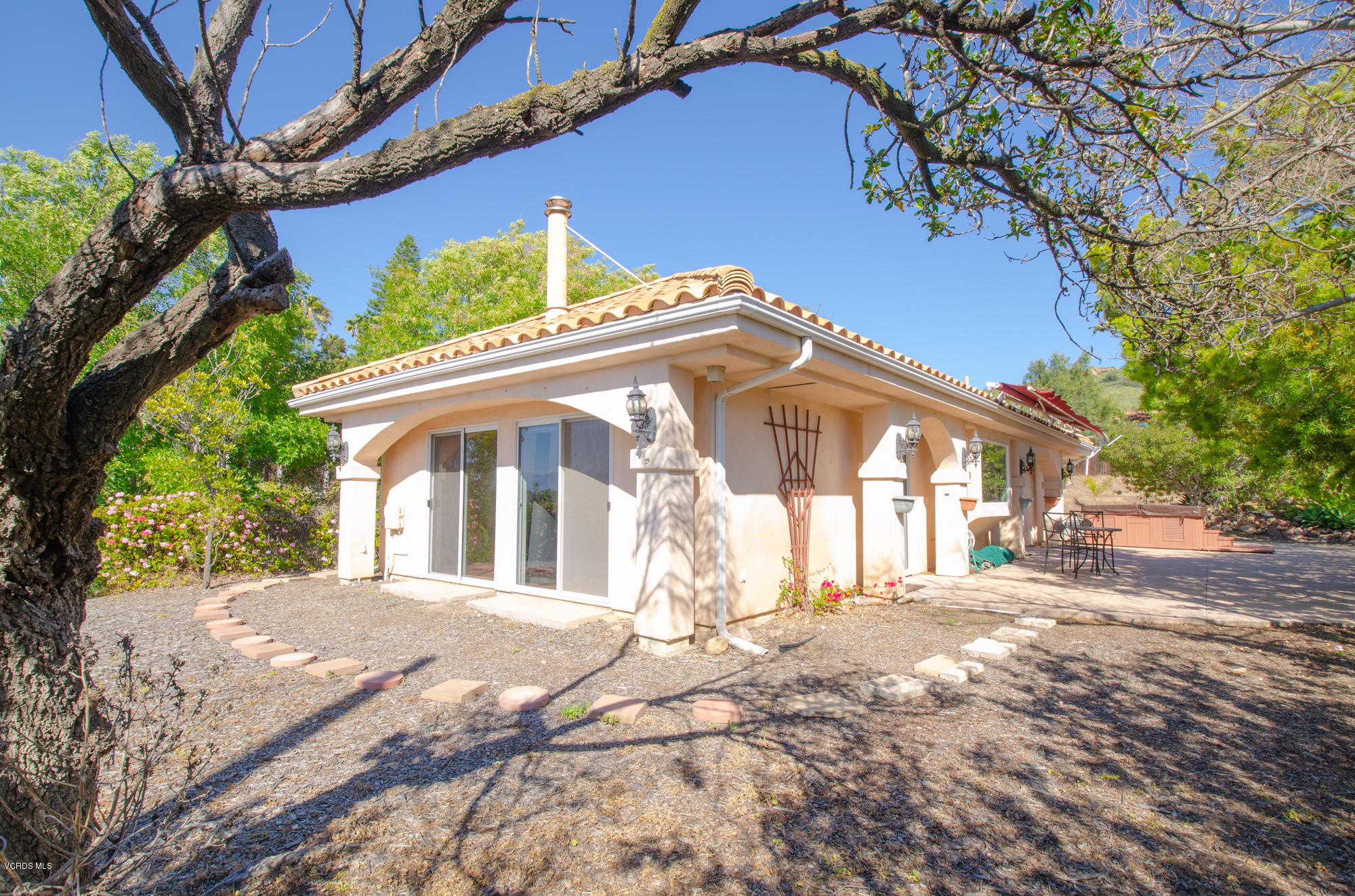 180 Sundown Road Thousand Oaks, CA 91361 - Photo 24 of 32 a view of a house with a yard