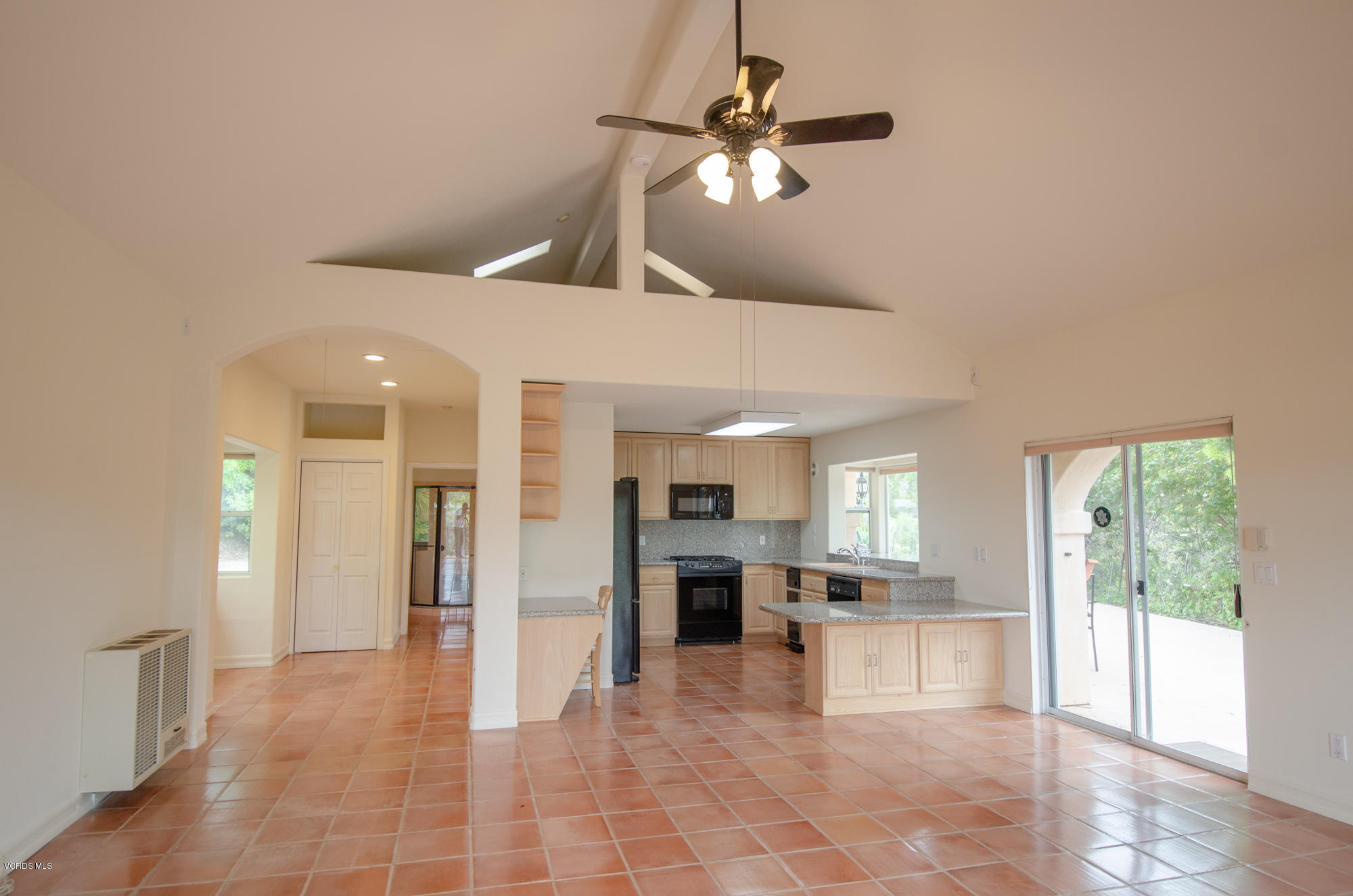 180 Sundown Road Thousand Oaks, CA 91361 - Photo 25 of 32 a view of a kitchen with a sink and microwave