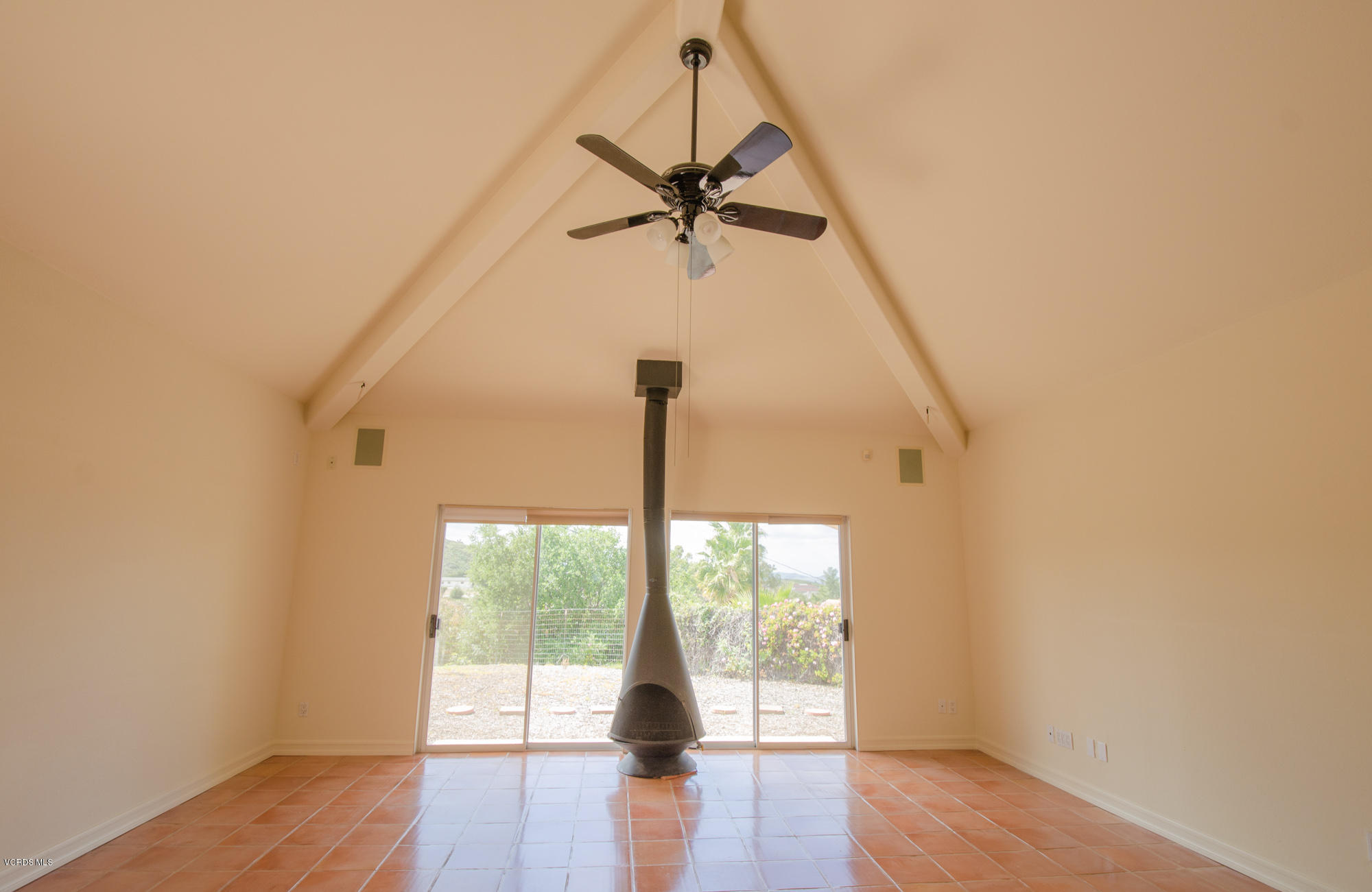 180 Sundown Road Thousand Oaks, CA 91361 - Photo 26 of 32 a view of empty room with wooden floor and fan