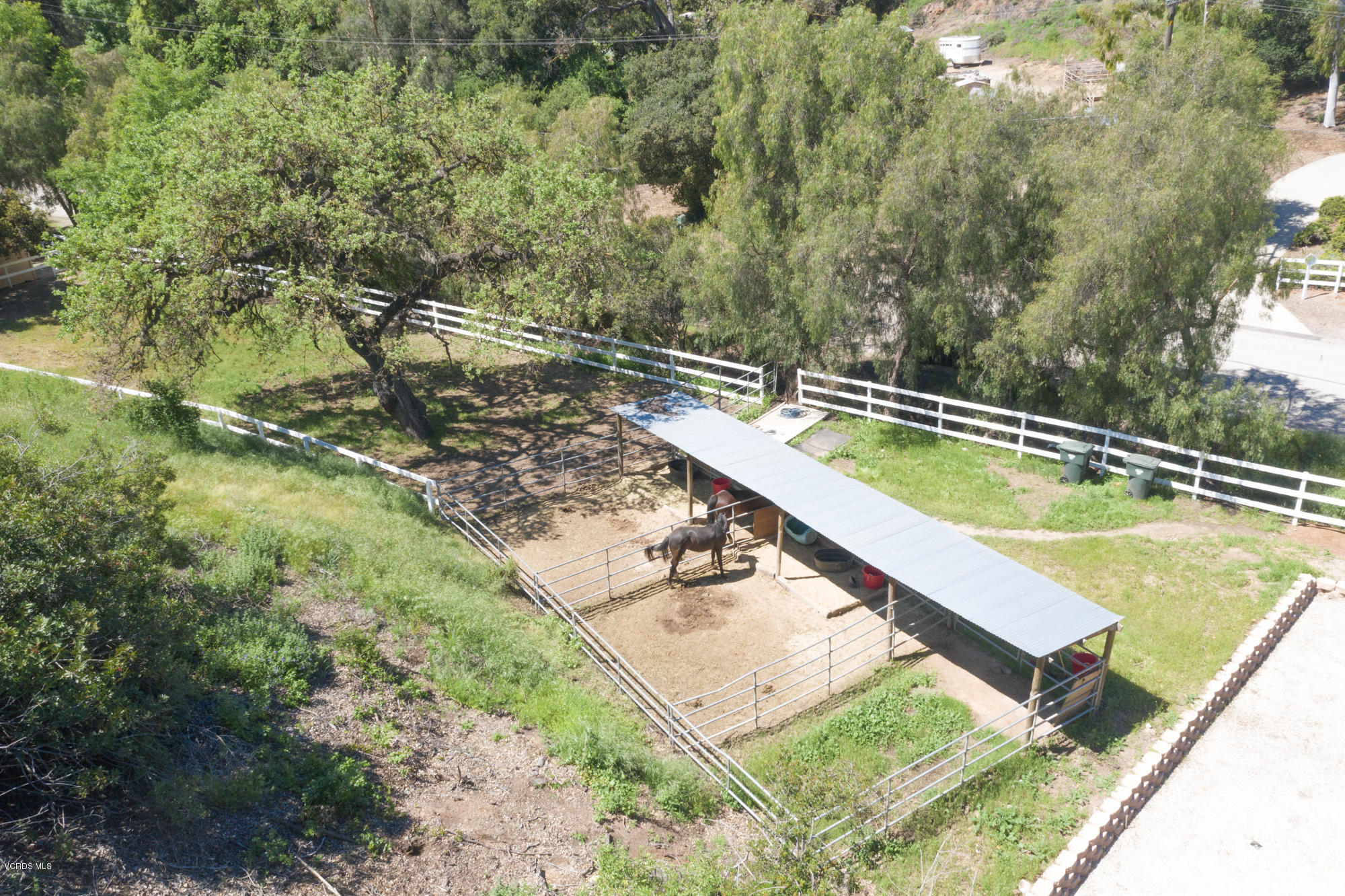 180 Sundown Road Thousand Oaks, CA 91361 - Photo 29 of 32 a view of a swimming pool with a yard