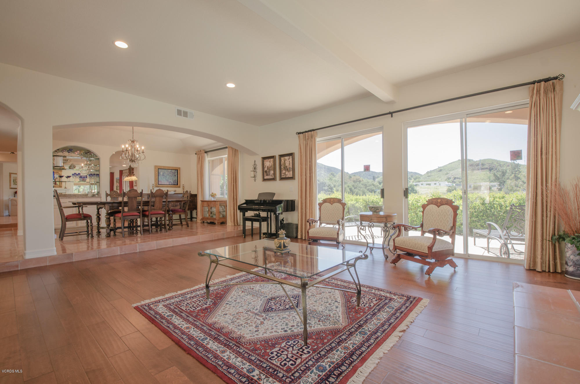 180 Sundown Road Thousand Oaks, CA 91361 - Photo 7 of 32 a living room with furniture and a table