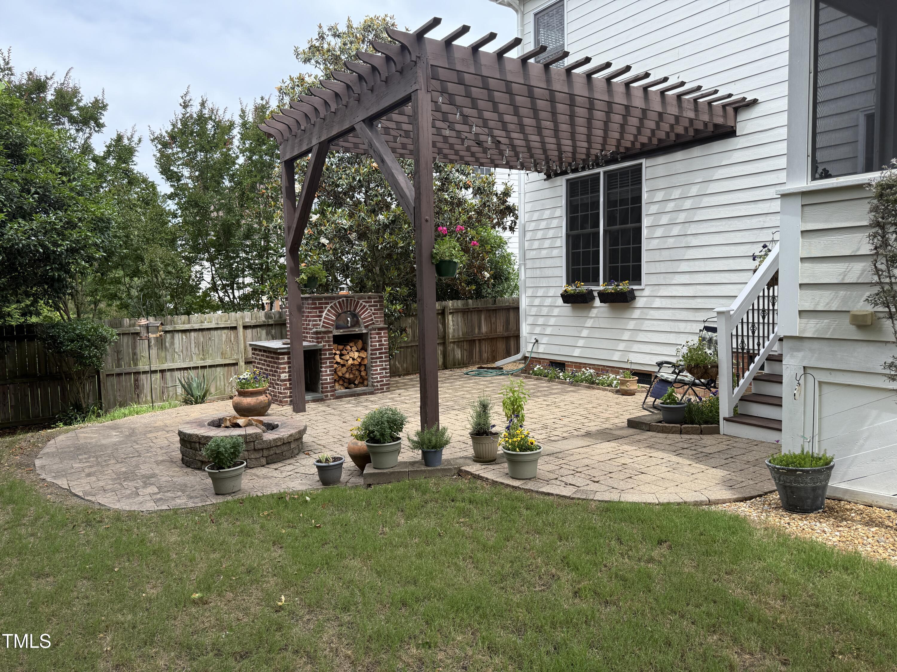 6020 Jones Farm Road Wake Forest, NC 27587 - Photo 25 of 29 patio with pergola & fire pit