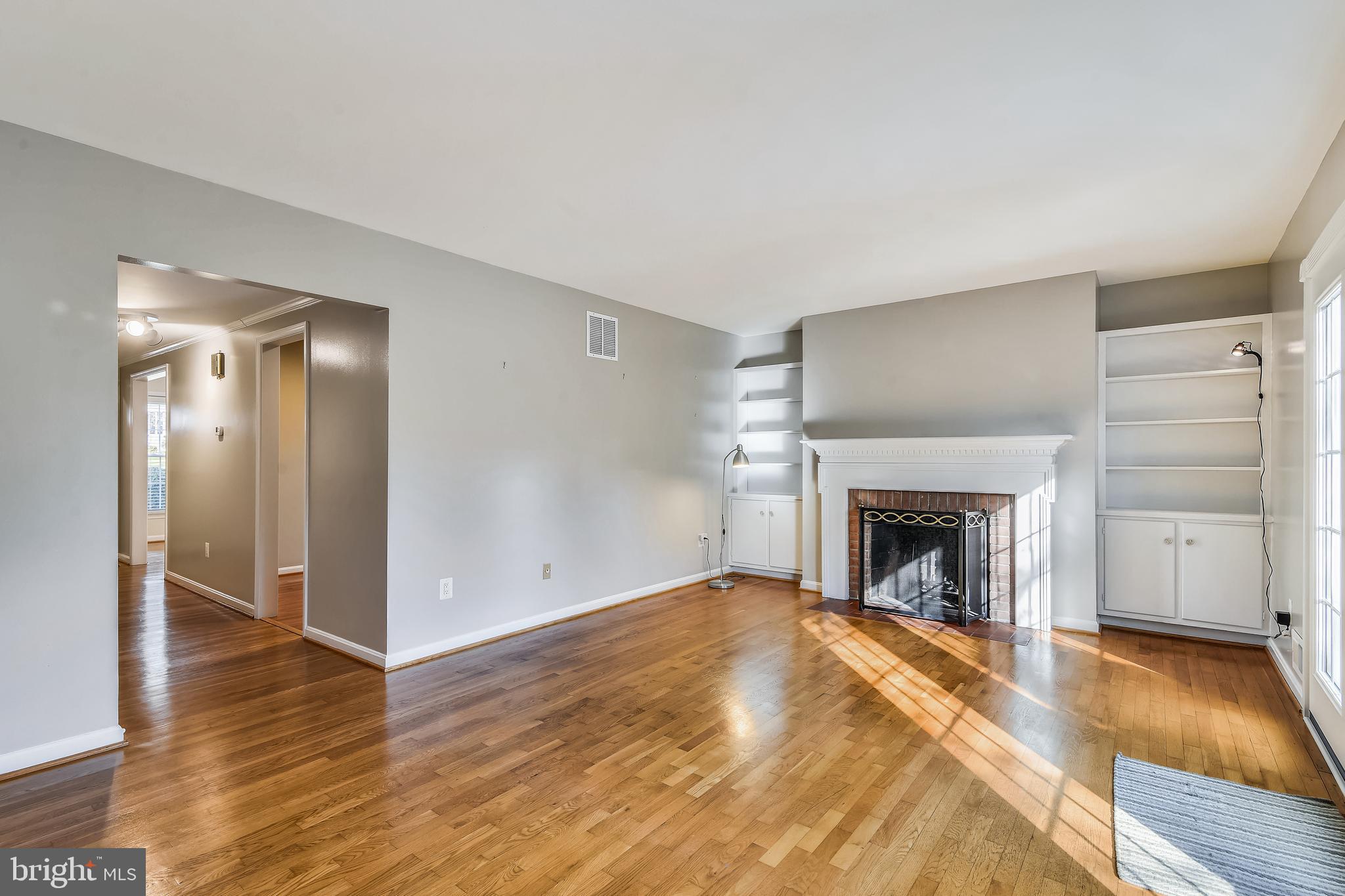 6819 Melrose Drive McLean, VA 22101 - Photo 16 of 45 Built-Ins & Wood Burning Fireplace