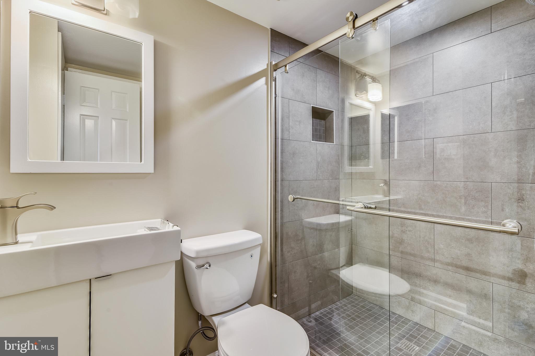 6819 Melrose Drive McLean, VA 22101 - Photo 30 of 45 Chic Renovated Lower Level Bathroom