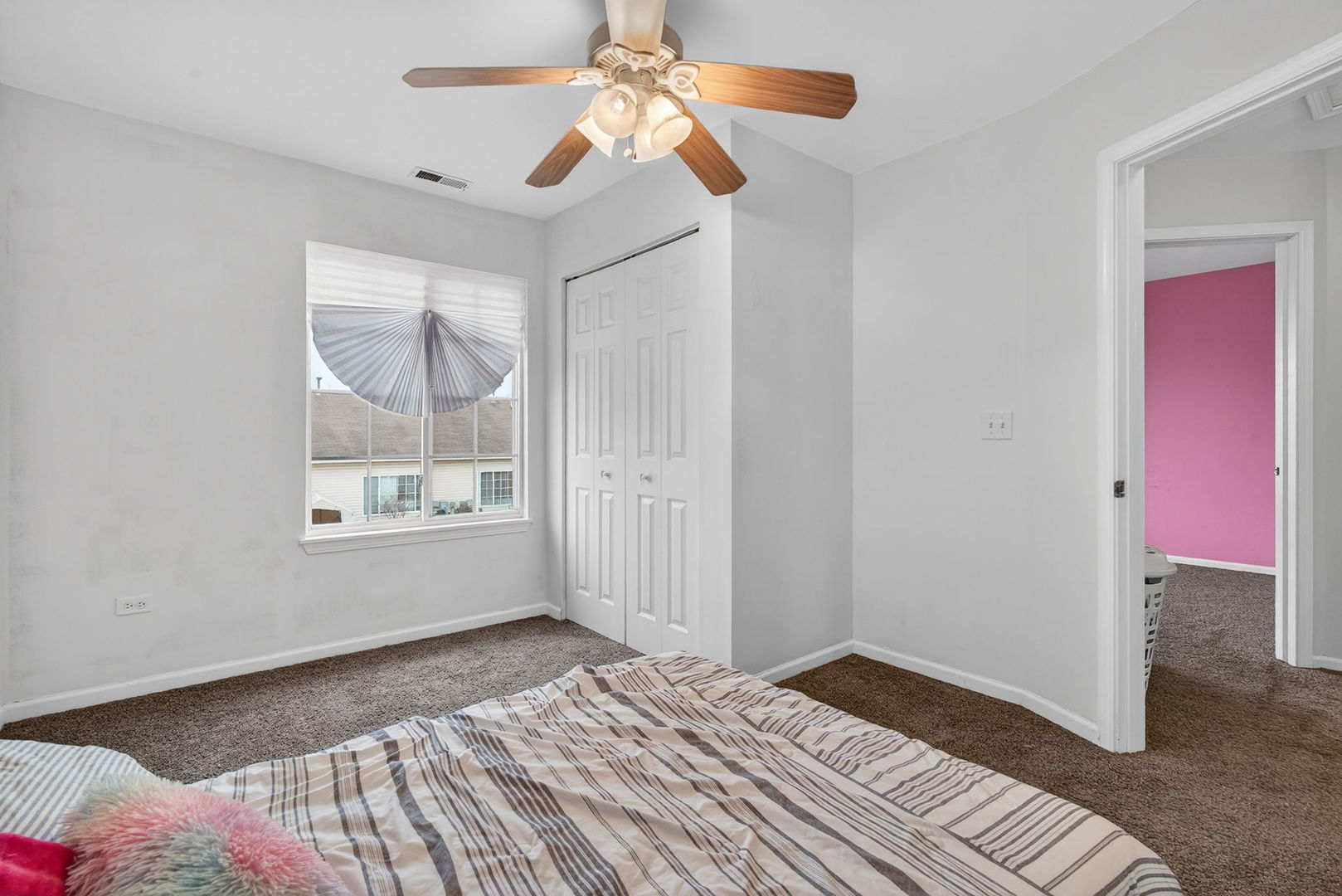 1451 Red Top Lane Minooka, IL 60447 - Photo 24 of 37 a bedroom with a bed and a window