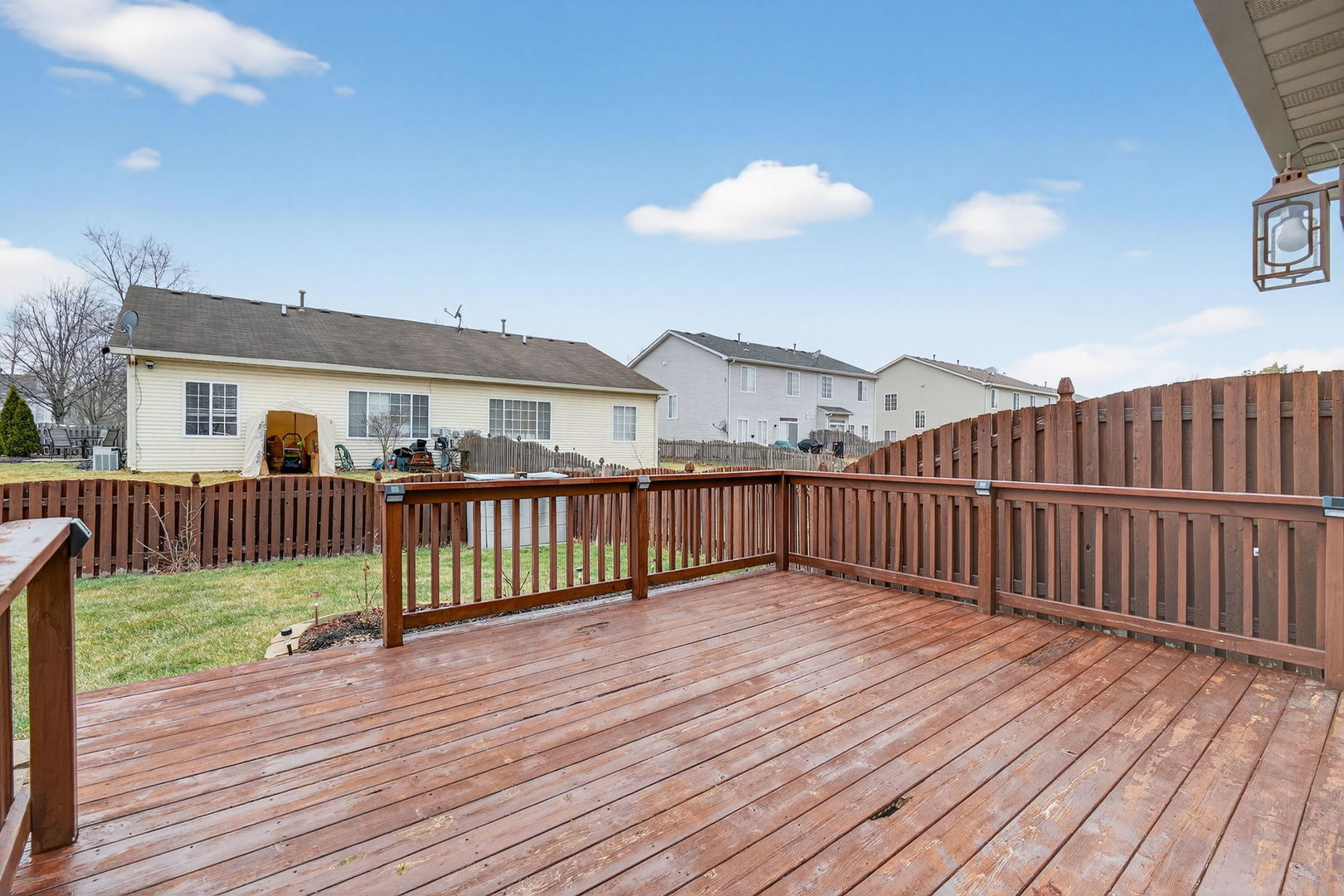 1451 Red Top Lane Minooka, IL 60447 - Photo 30 of 37 a view of a house with wooden deck