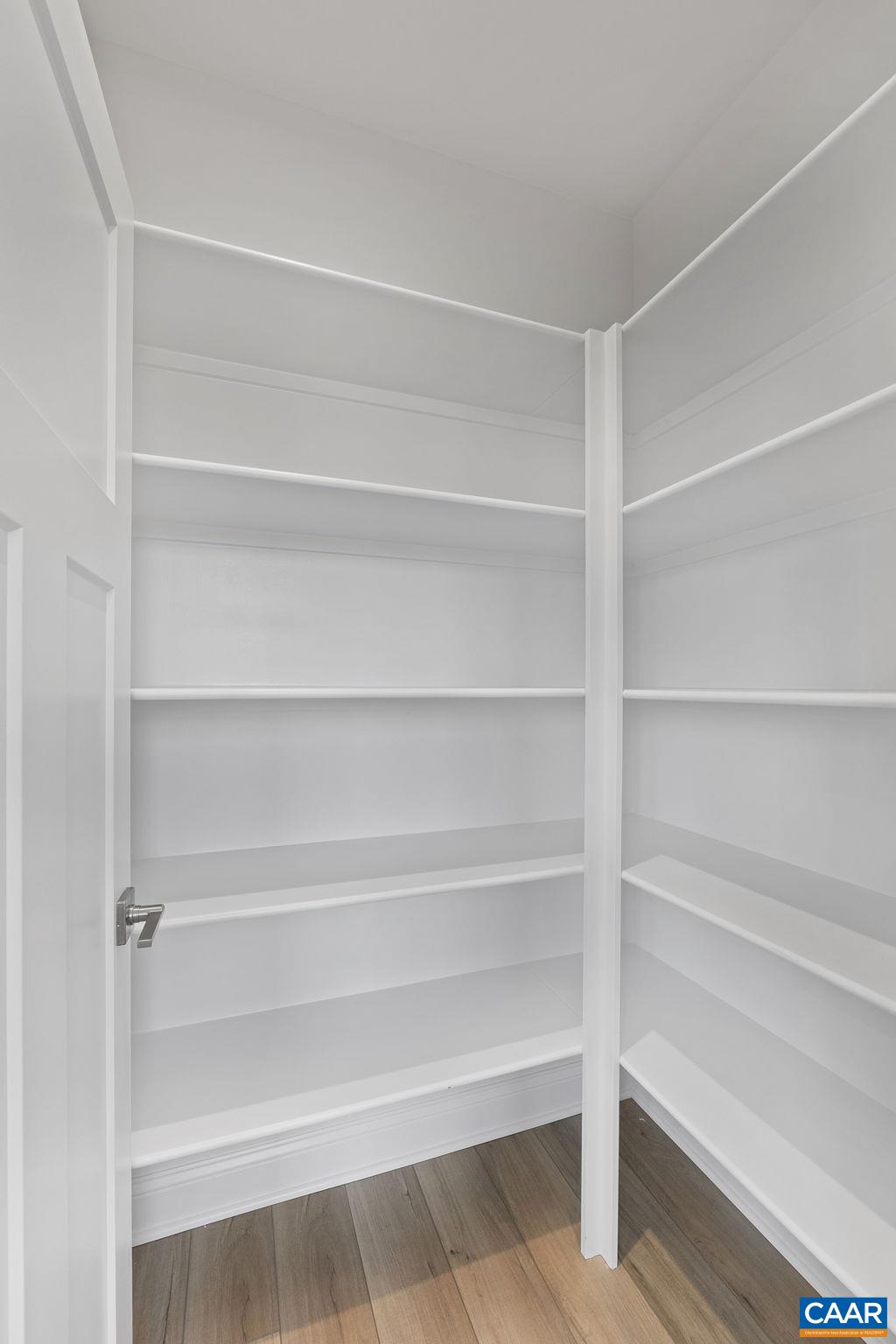 2269 Woodburn Road Charlottesville, VA 22901 - Photo 11 of 39 a view of walk in closet with empty racks