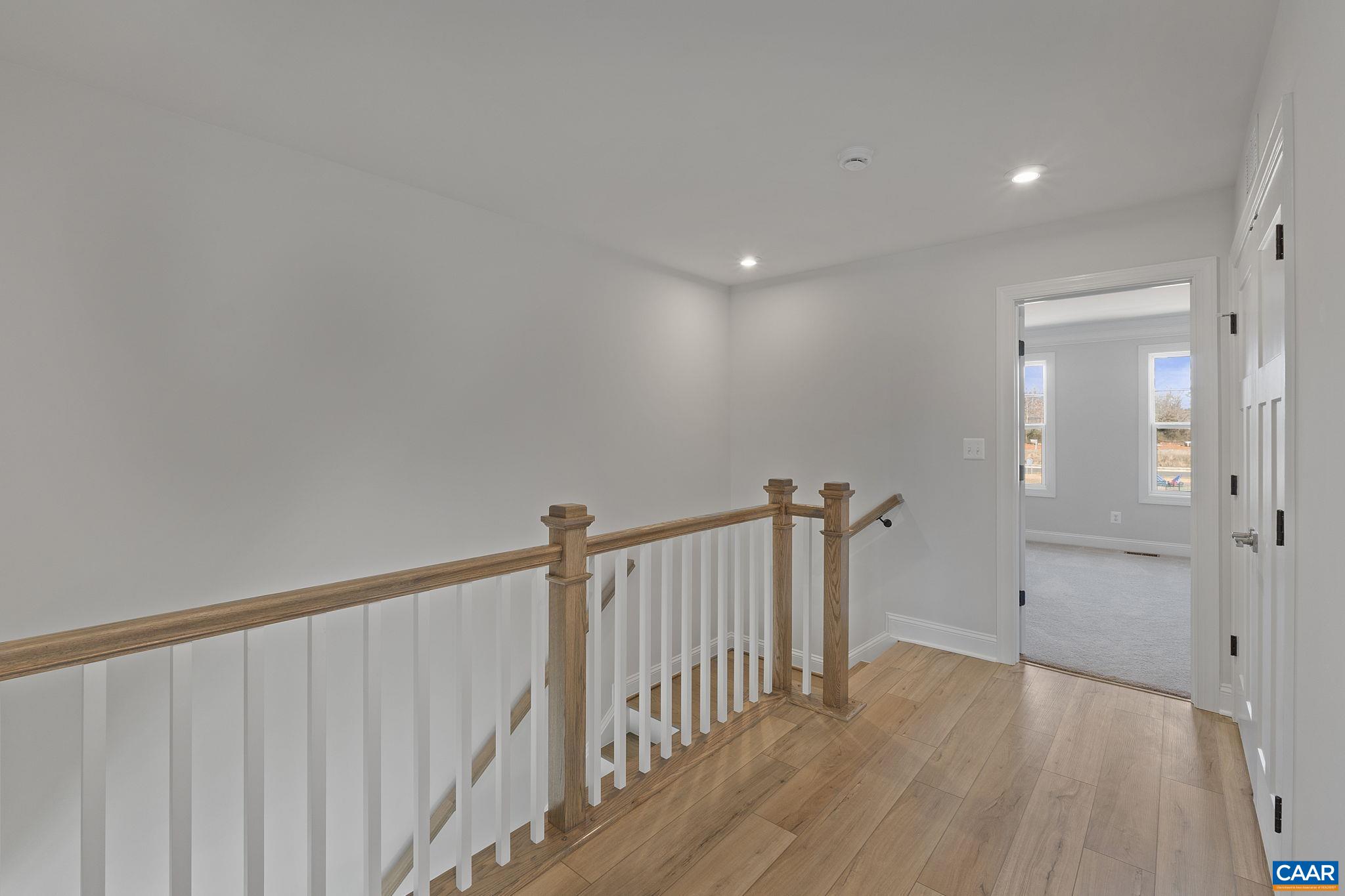 2269 Woodburn Road Charlottesville, VA 22901 - Photo 19 of 39 a view of hallway with wooden floor
