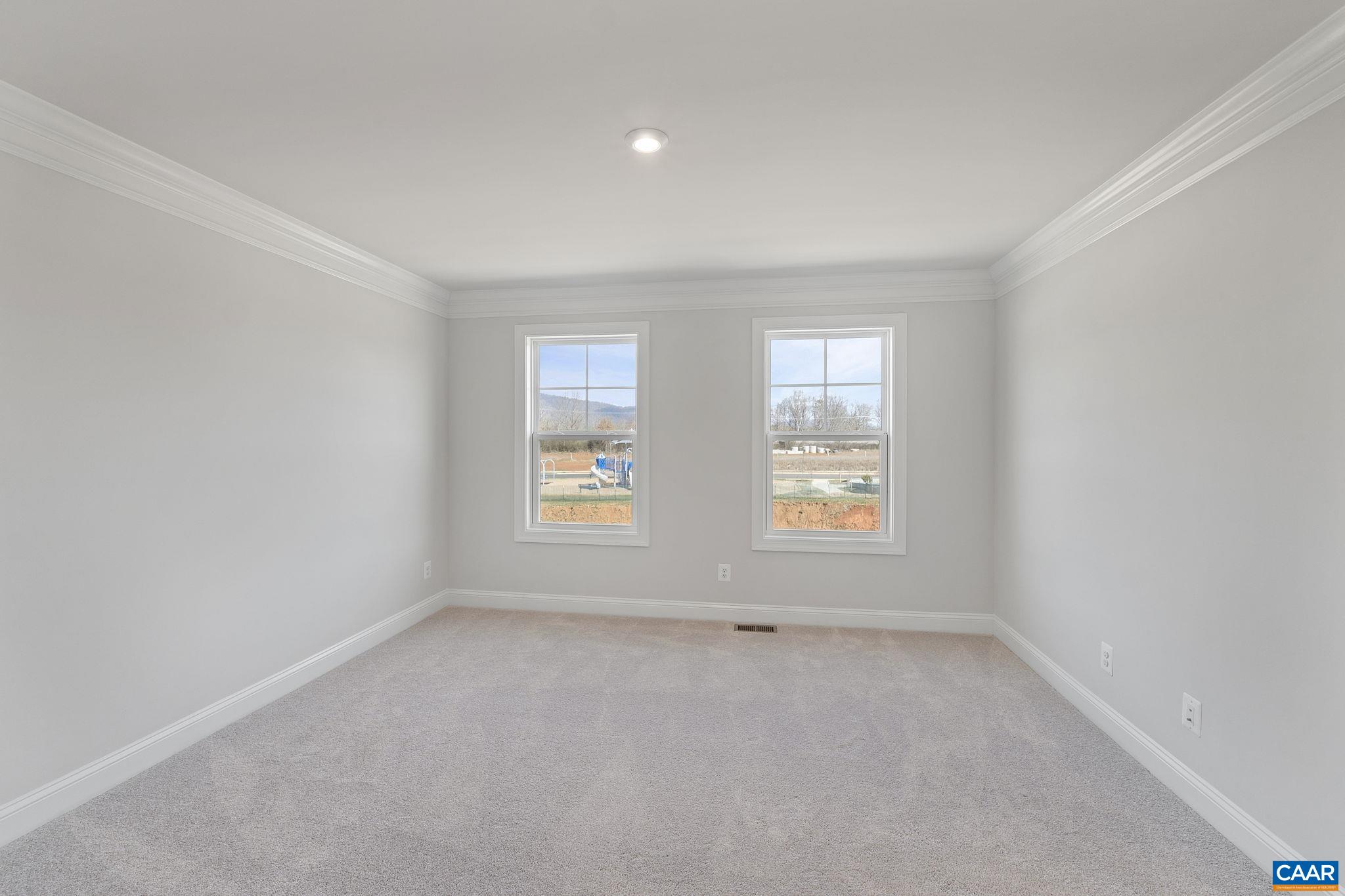 2269 Woodburn Road Charlottesville, VA 22901 - Photo 20 of 39 an empty room with a window