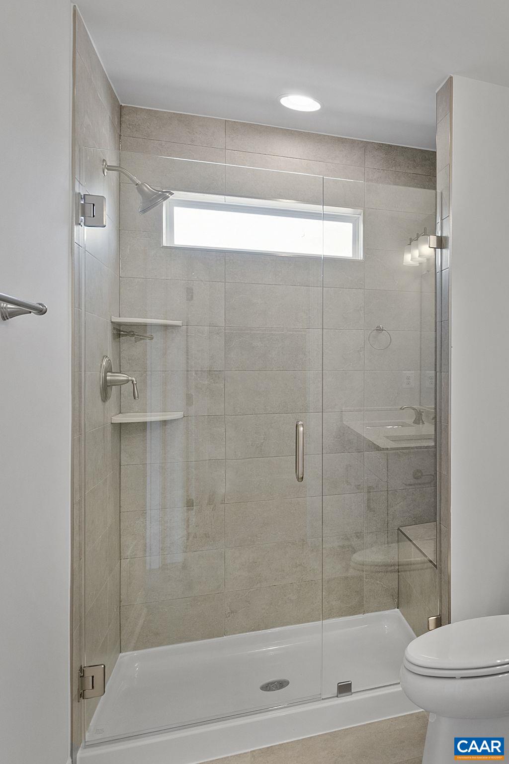 2269 Woodburn Road Charlottesville, VA 22901 - Photo 23 of 39 a bathroom with a shower and a toilet