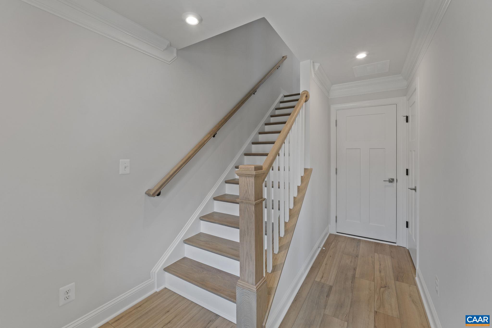 2269 Woodburn Road Charlottesville, VA 22901 - Photo 4 of 39 a view of a hallway with wooden floor and entryway