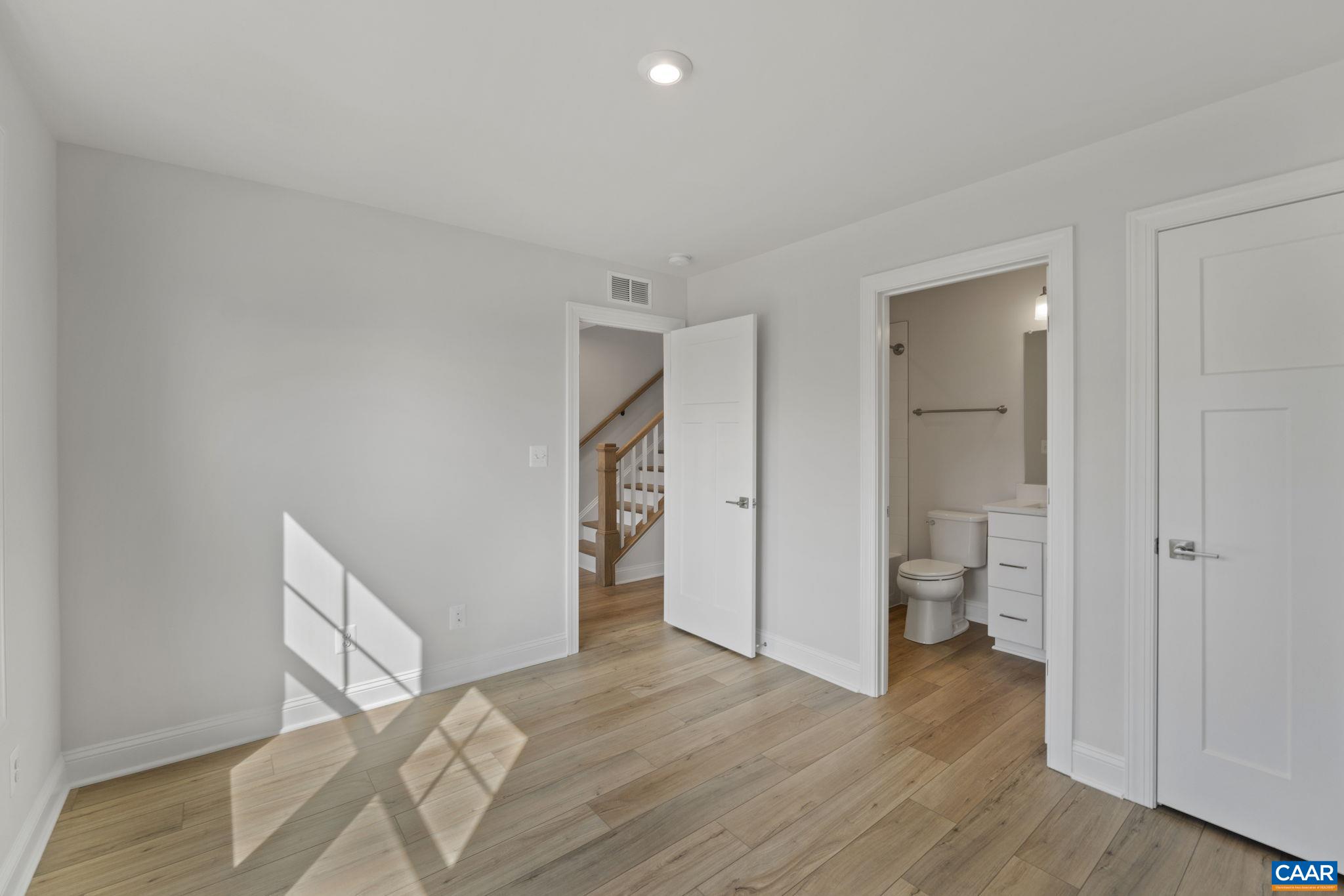 2269 Woodburn Road Charlottesville, VA 22901 - Photo 6 of 39 a bathroom with a sink and a toilet