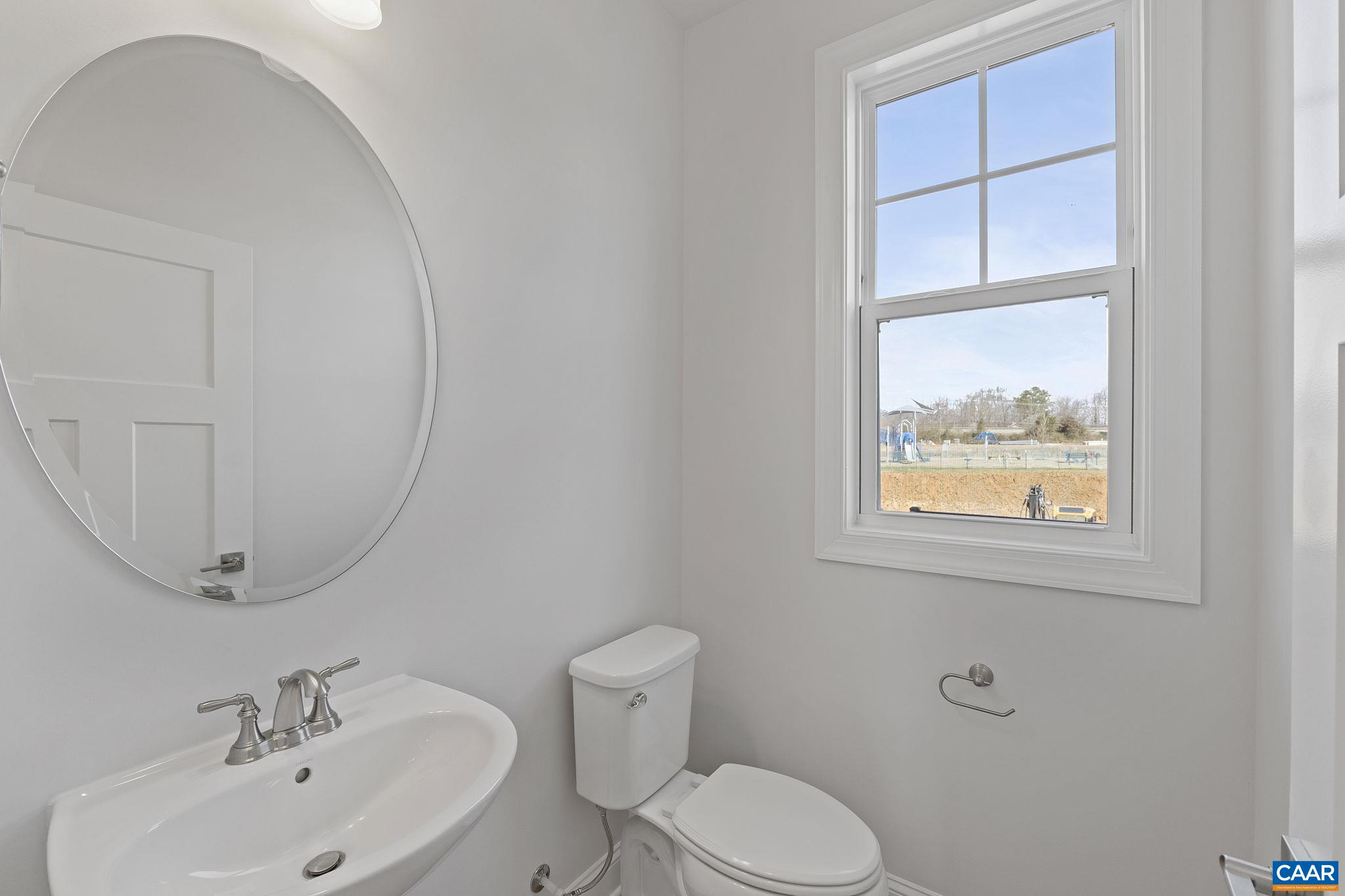 2269 Woodburn Road Charlottesville, VA 22901 - Photo 10 of 39 a bathroom with a sink mirror and toilet