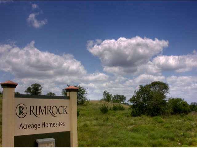 351 Hawthorne Loop, Unit SIDE Driftwood, TX 78619 - Photo 1 of 1 a view of a sign board and yard