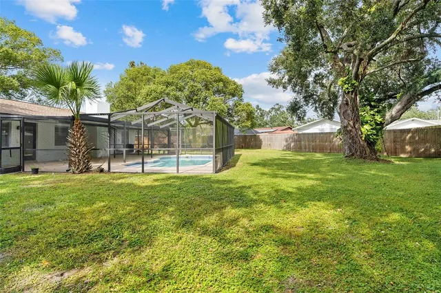 a view of a backyard with a garden