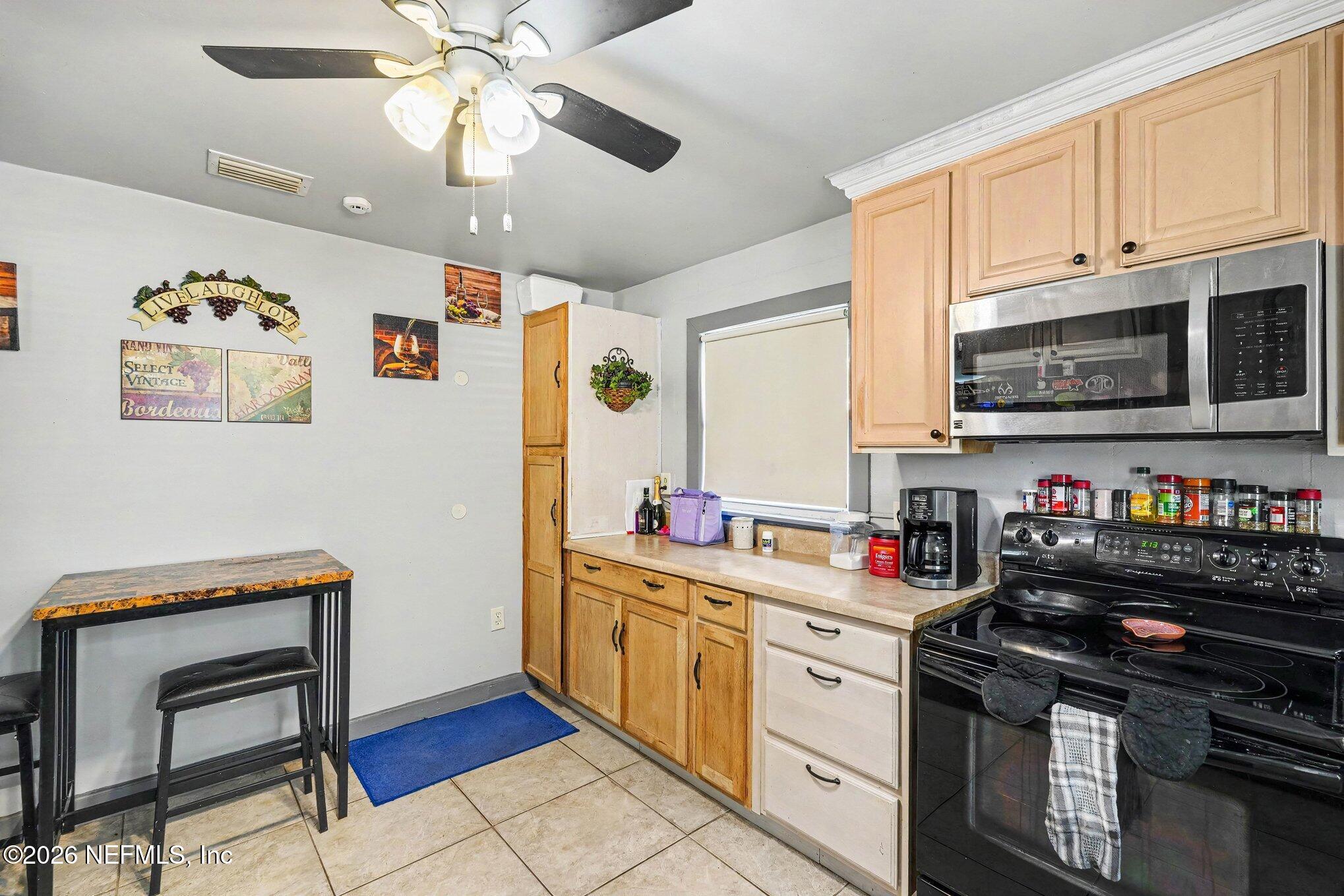 3500 Roosevelt Road Mims, FL 32754 - Photo 11 of 30 011_file_7540