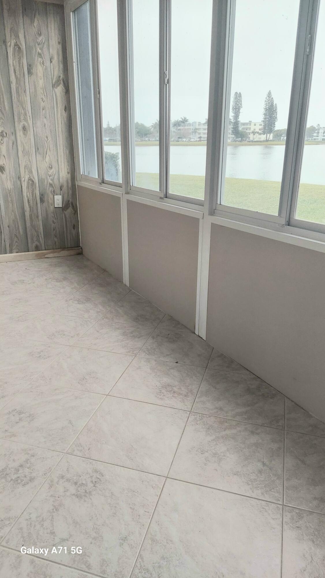 1032 Ainslie Drive, Unit 1032 Boca Raton, FL 33434 - Photo 14 of 39 sunroom