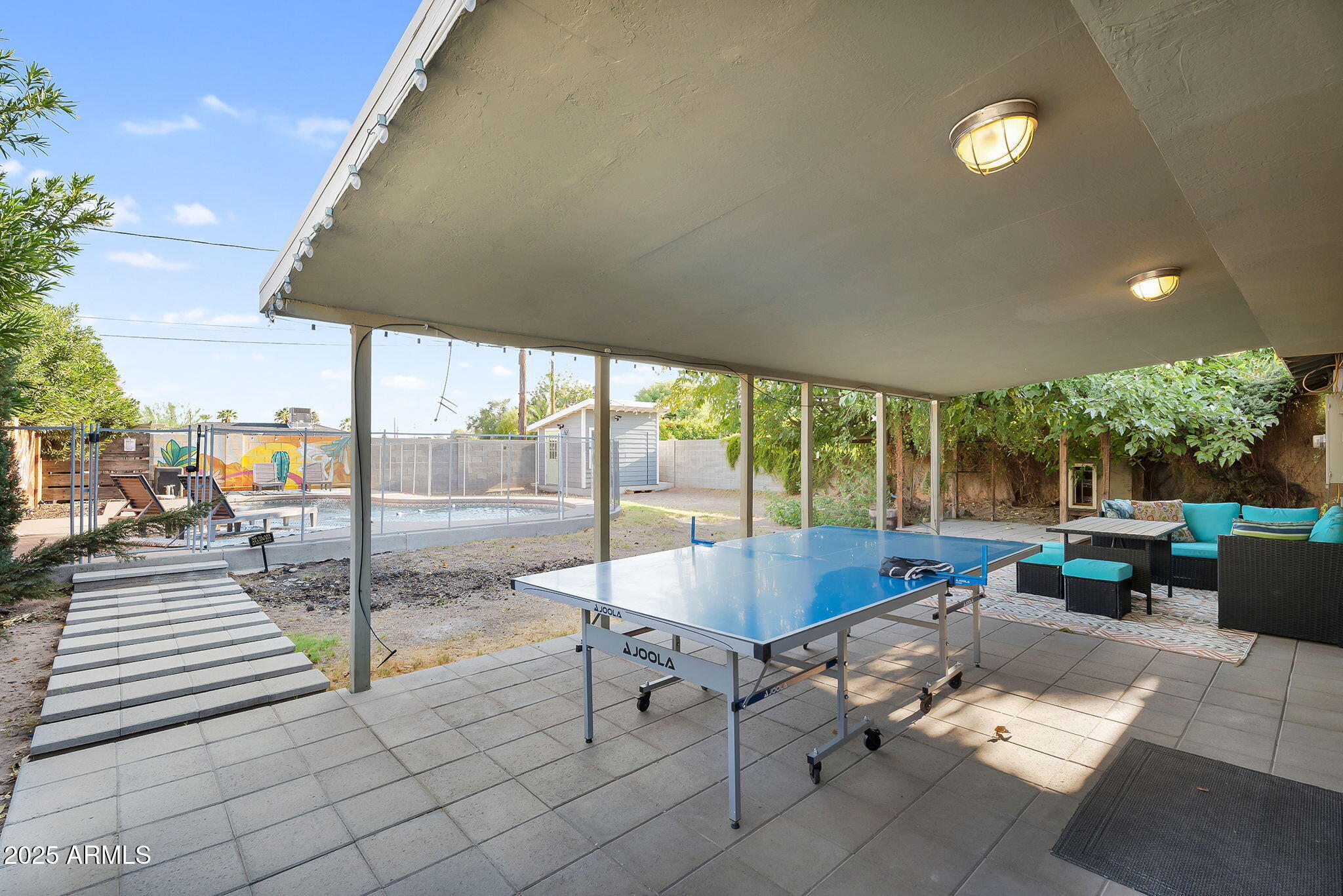 1035 East Pierson Street Phoenix, AZ 85014 - Photo 30 of 34 a building outdoor space with patio furniture and potted plants