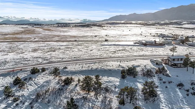 a view of water heater and covered with wooden floor