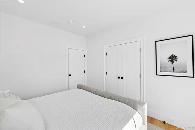 a bathroom with a sink a toilet and a window